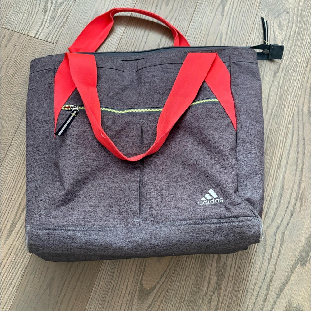 Adidas Gray and Red Duffel Bag with Sporty Design